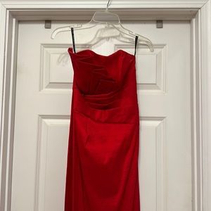 Stunning and classic strapless red dress.